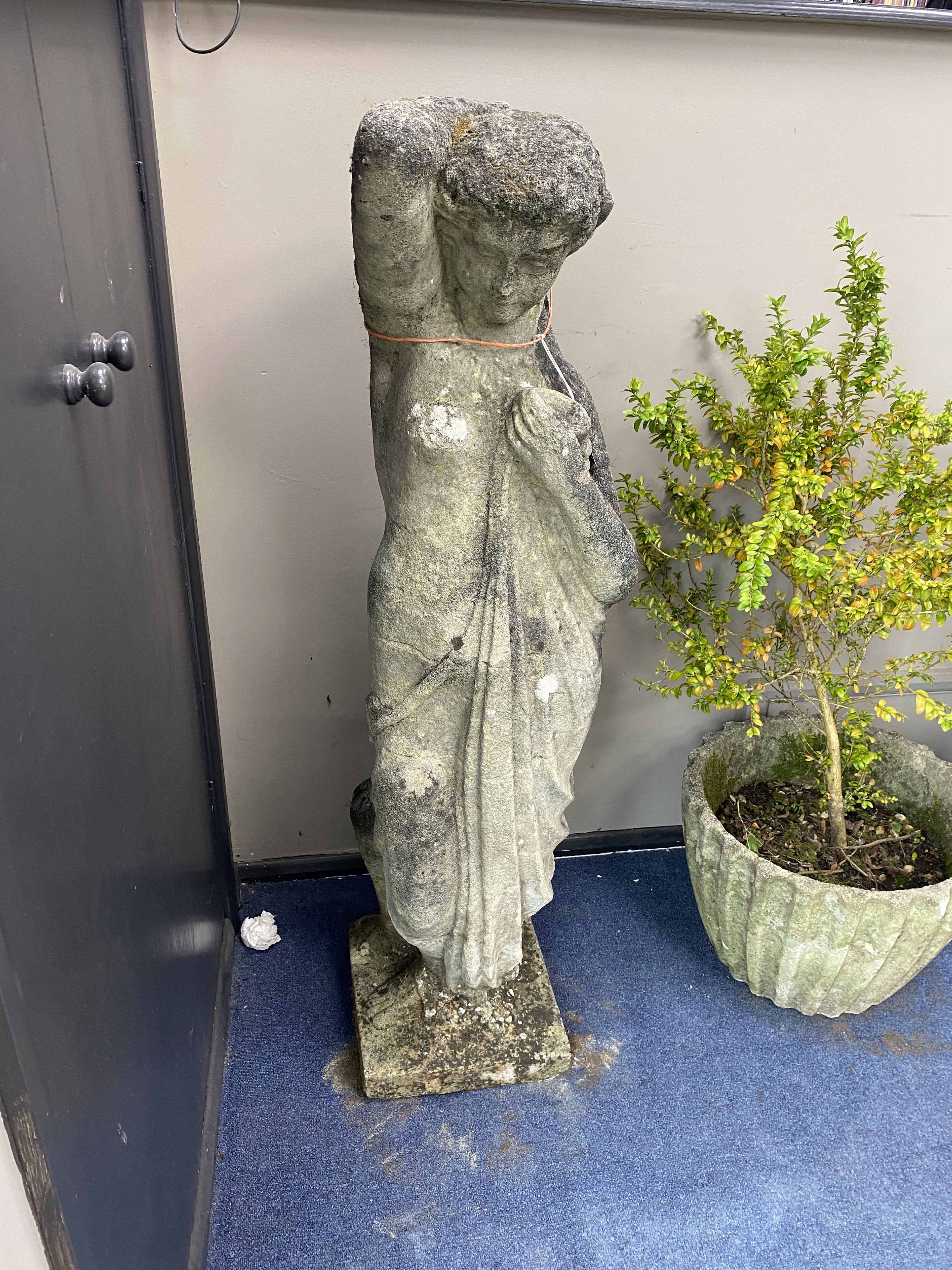 A reconstituted stone figure of Venus, on square plinth, height 130cm